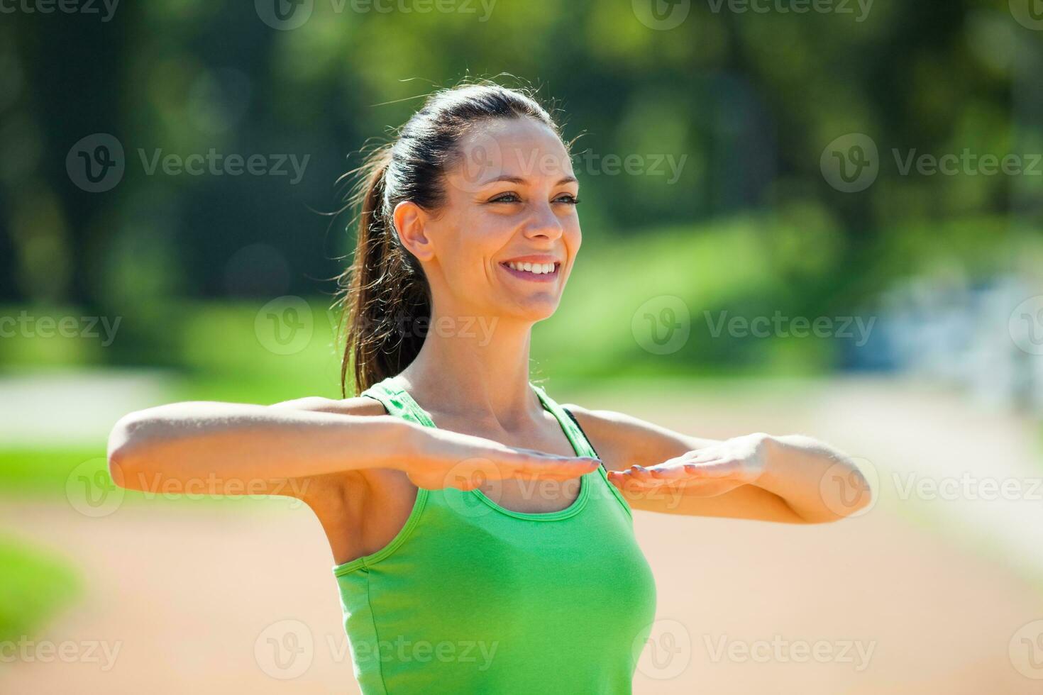 A woman doing physical exercises photo