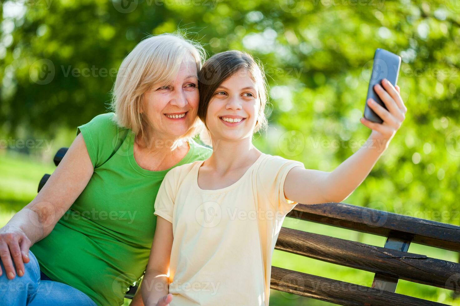 A grandmother spending time with her granddaughter photo