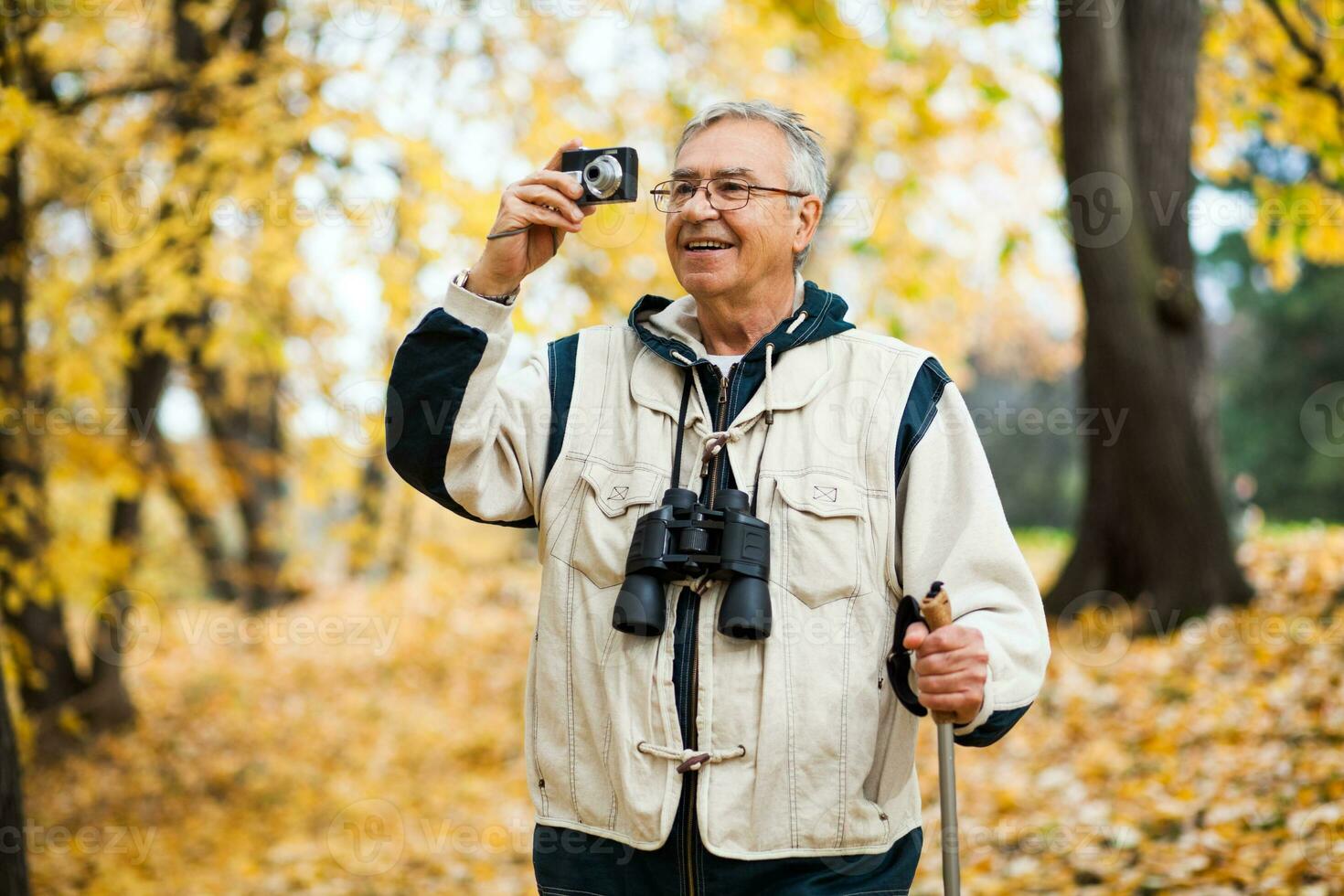 A senior man hiking photo