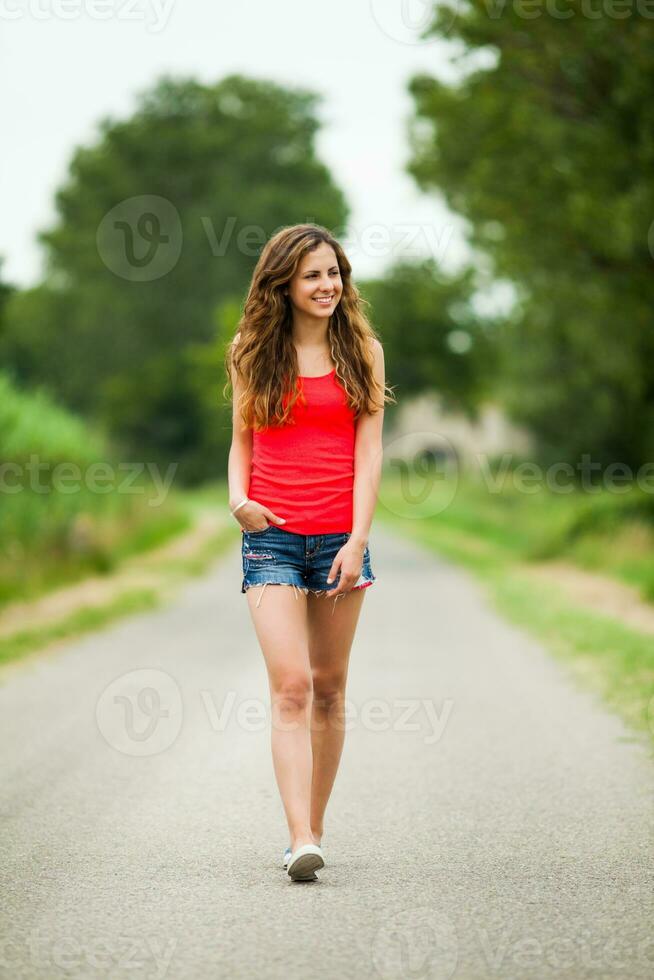 A woman spending time outdoors photo