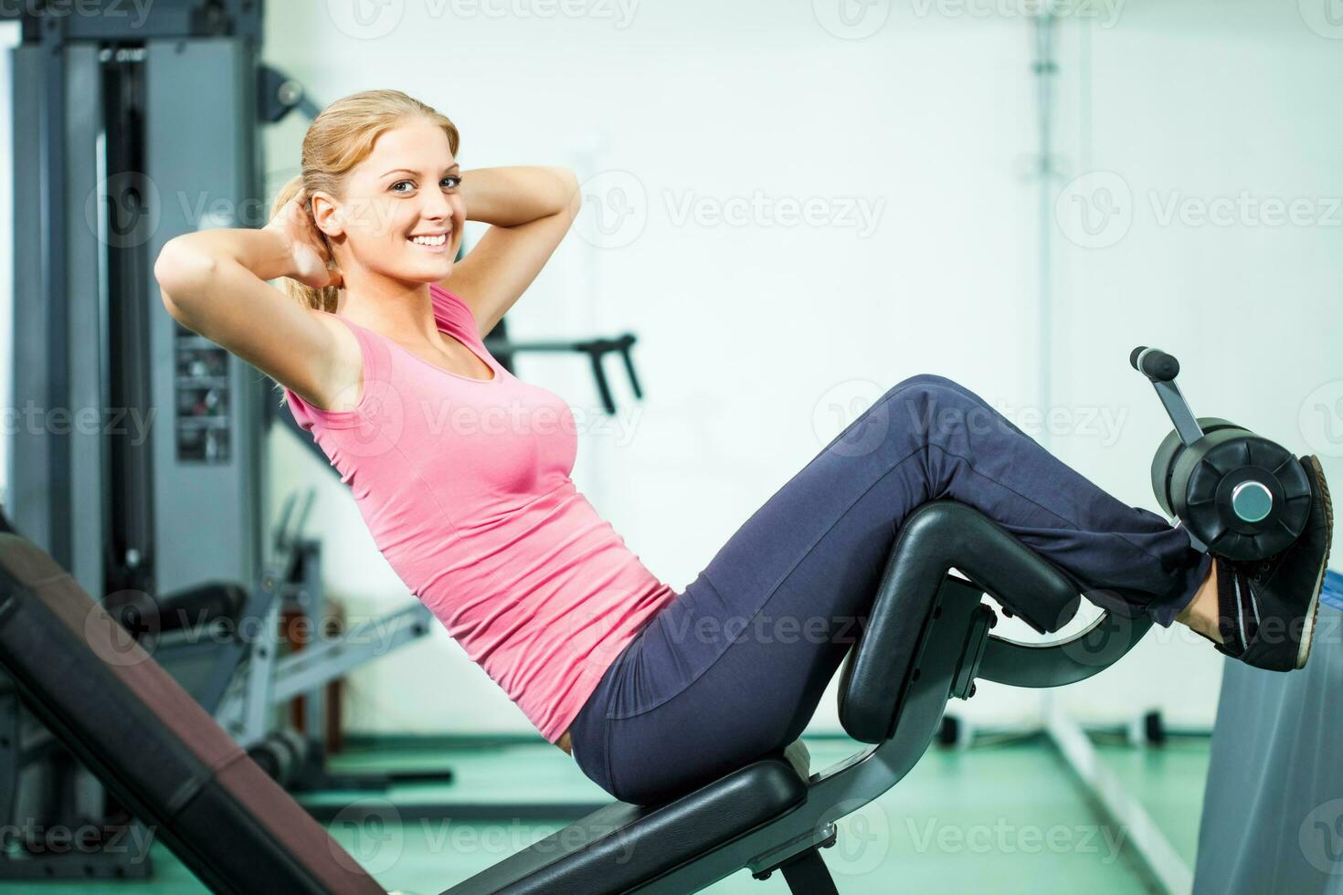 A woman doing physical exercises photo