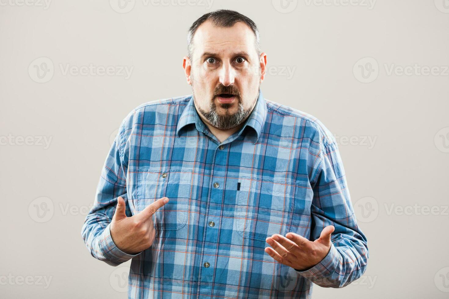 Portrait of a man with blue plaid shirt photo