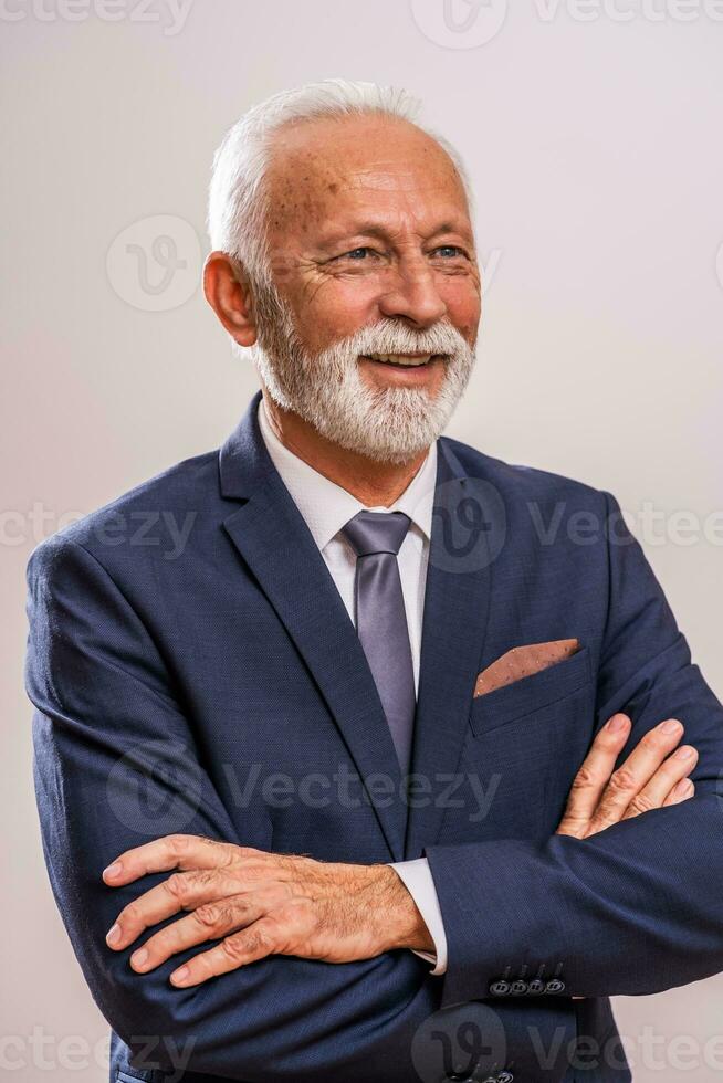 Portrait of a happy senior businessman photo