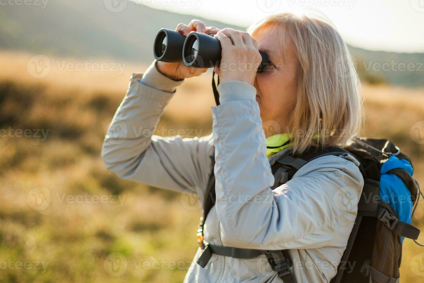A senior woman hiking photo