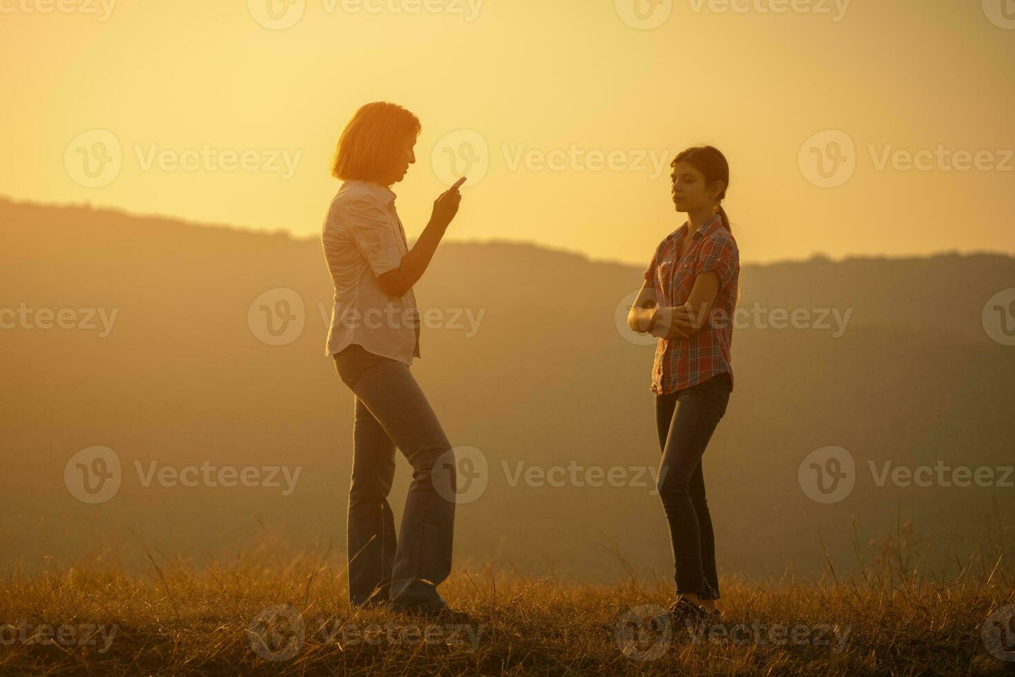 Grandmother and granddaughter spending time outdoors photo