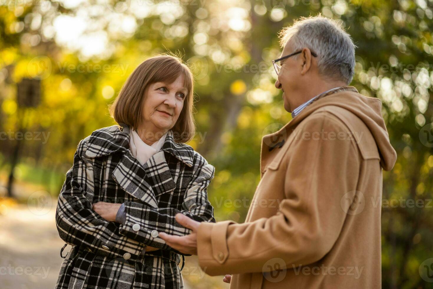 A senior couple spending time together in the park photo