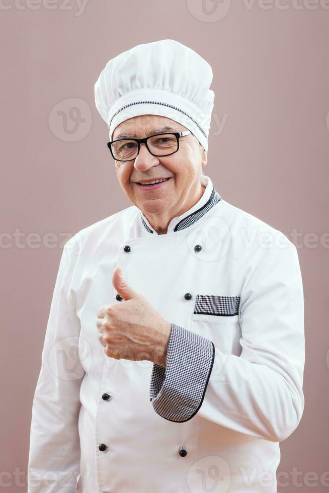 Portrait of a senior chef photo