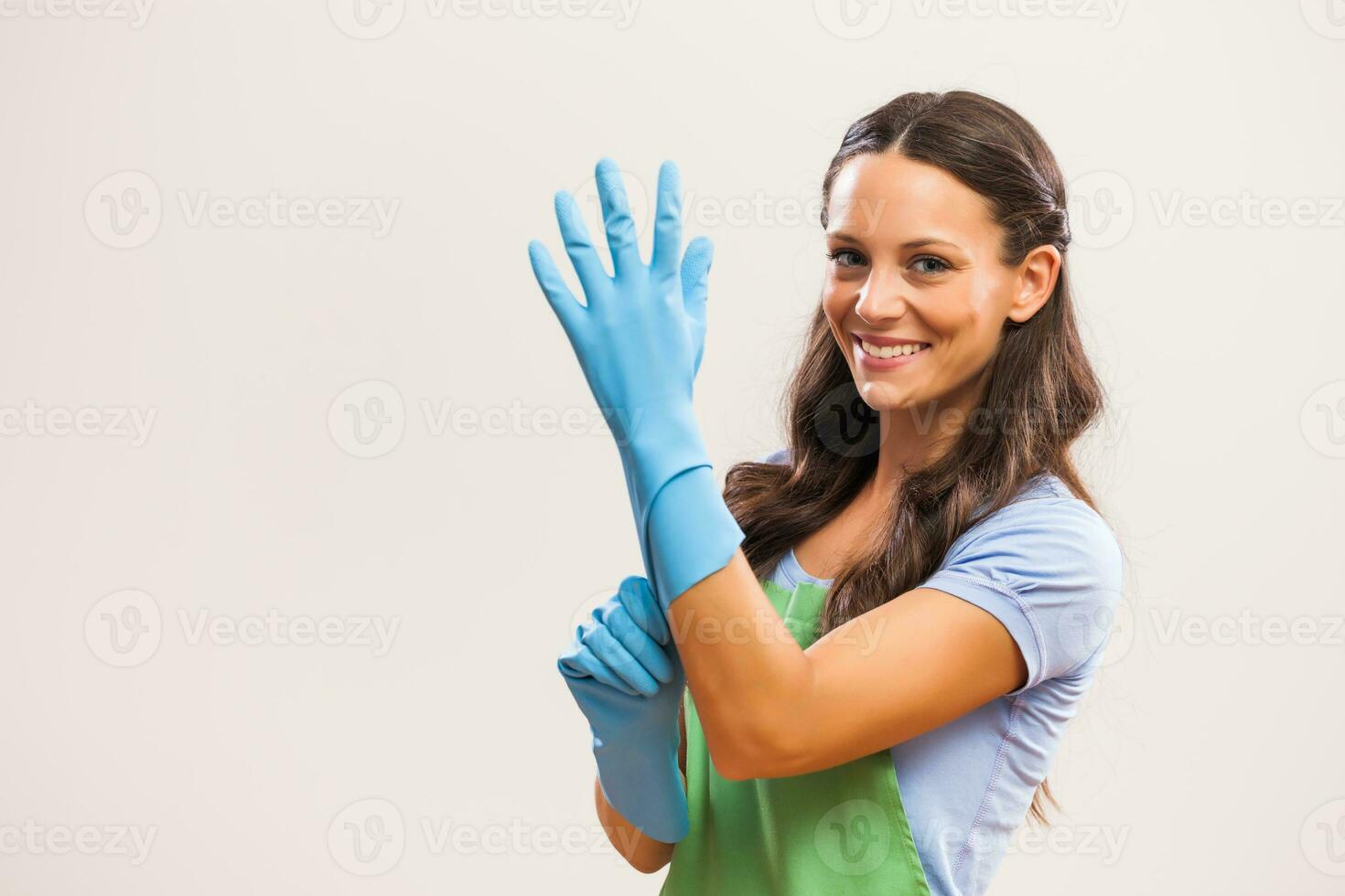 A woman ready to start cleaning photo