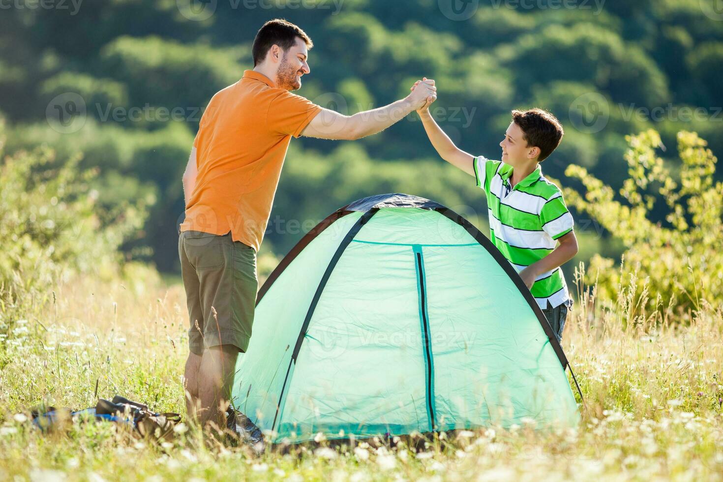 Father and son camping photo