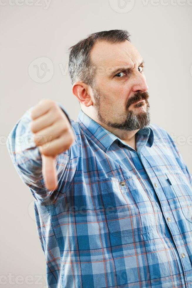 Portrait of a man with blue plaid shirt photo