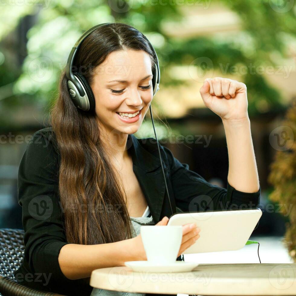 A woman hanging out at a coffee shop photo