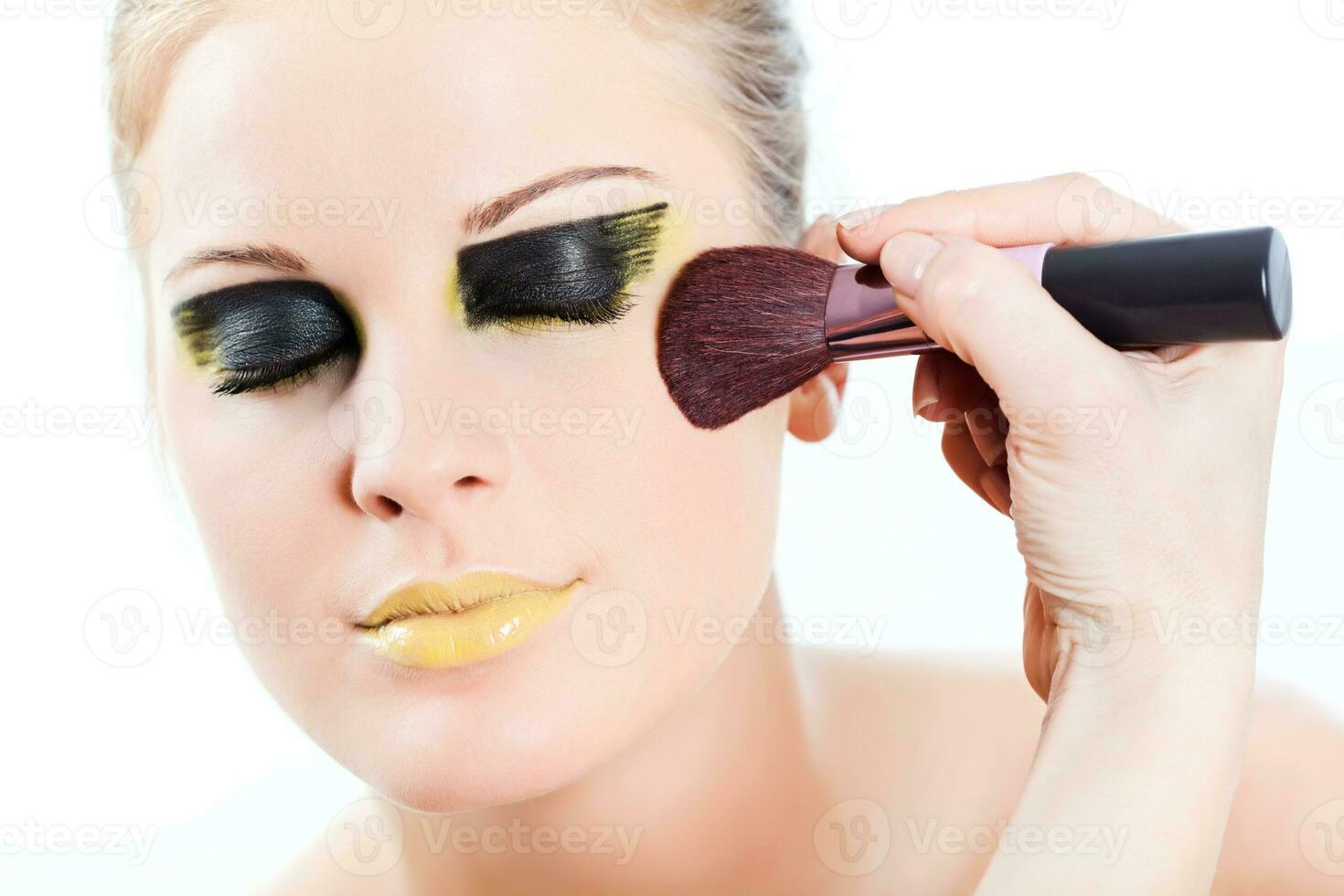 Portrait of young woman with fashion make-up photo