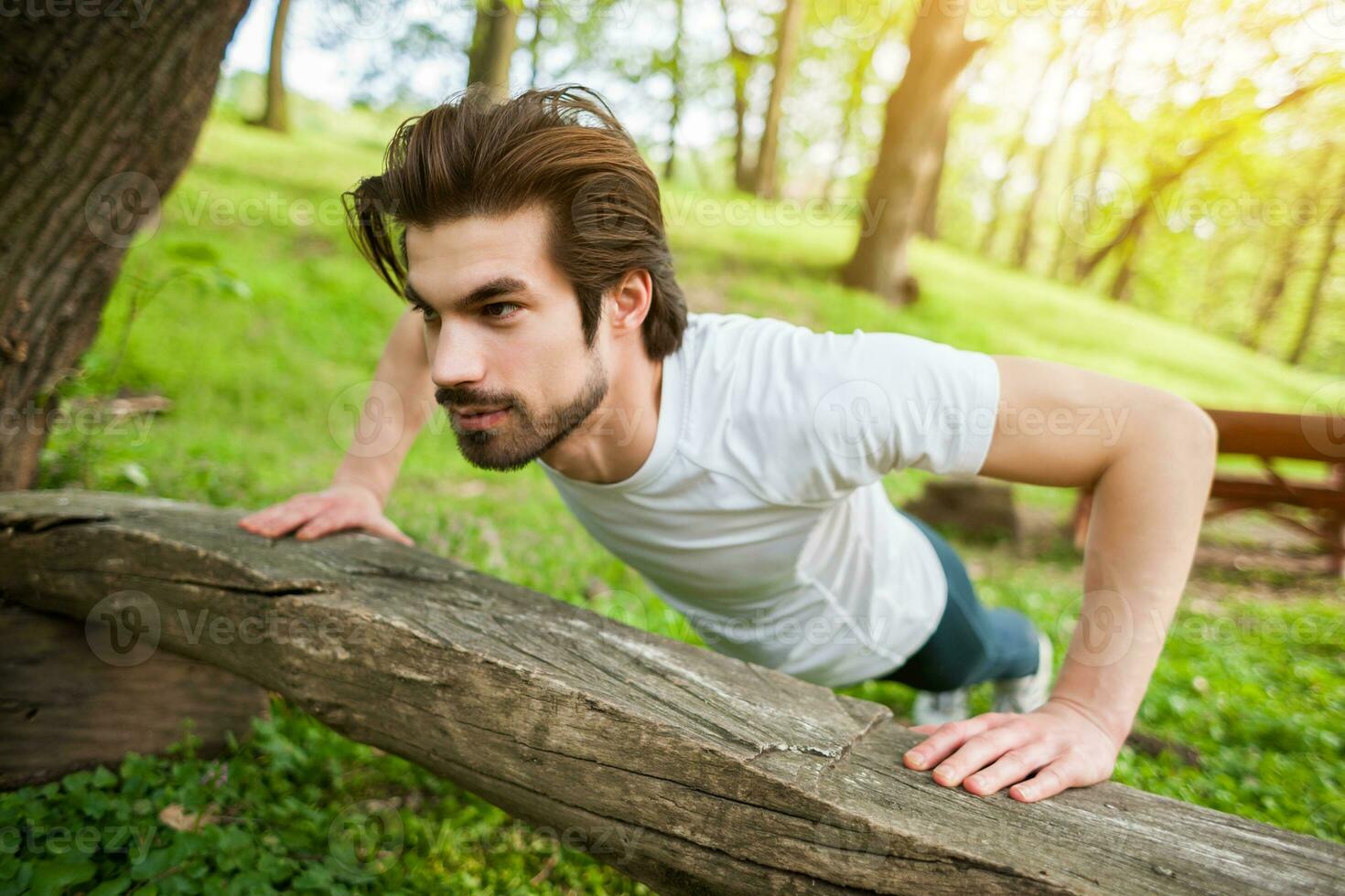 A man doing physical exercises photo