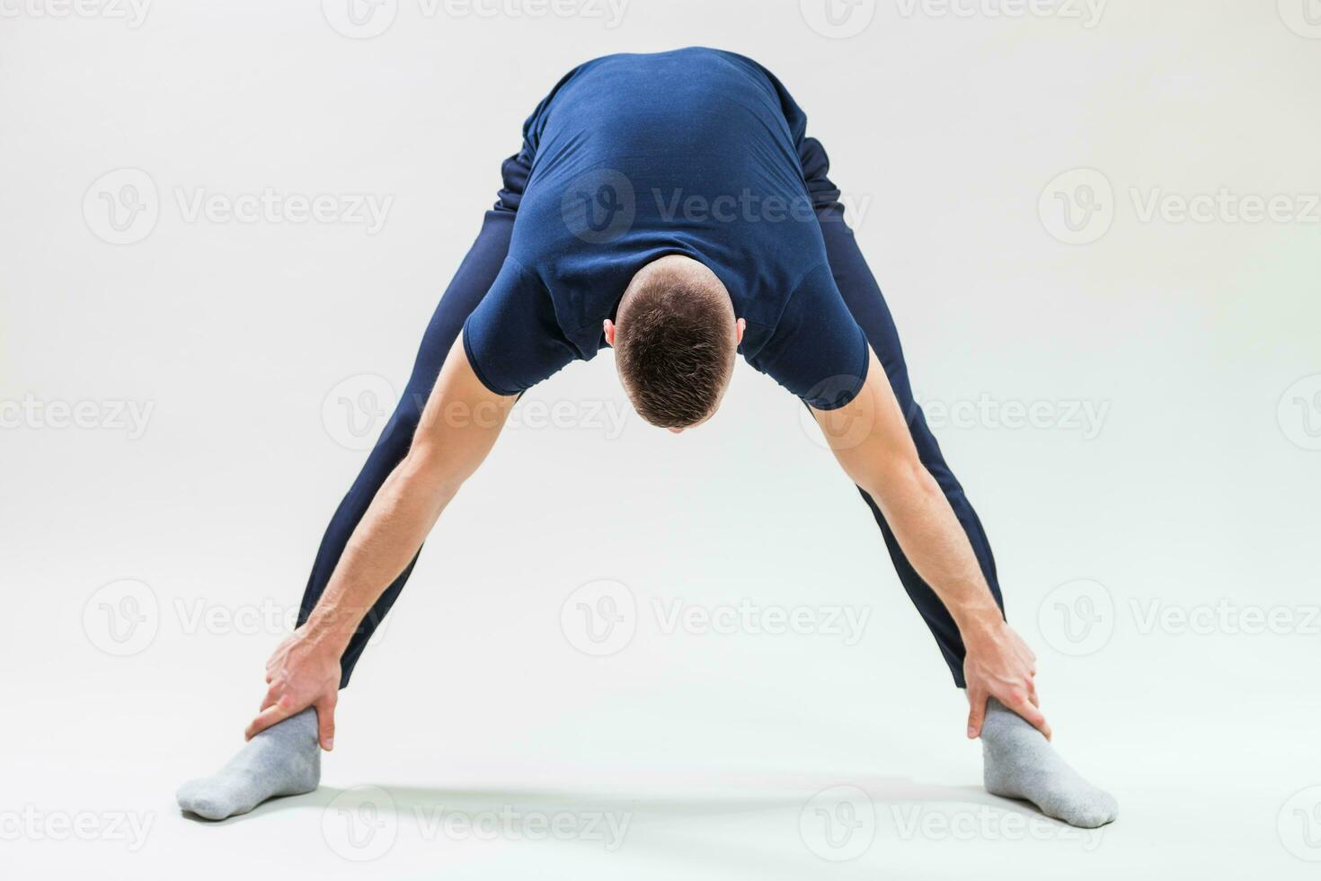 A man doing physical exercises photo