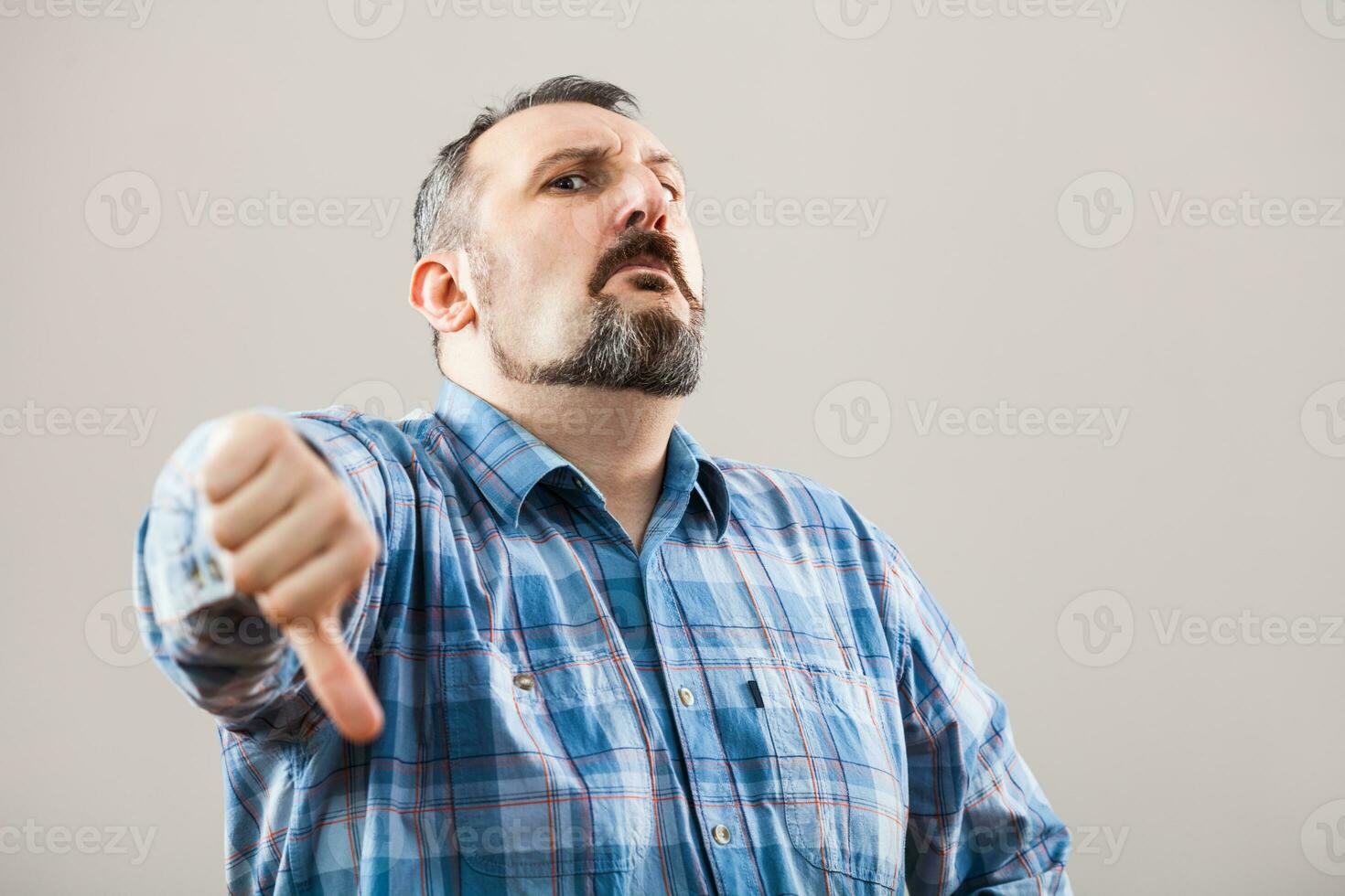 Portrait of a man with blue plaid shirt photo