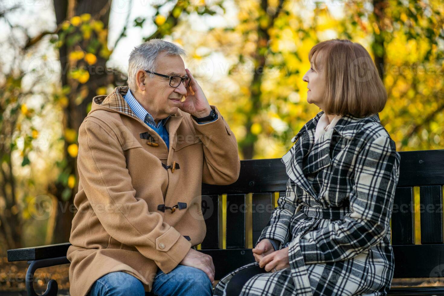 A senior couple spending time together in the park photo