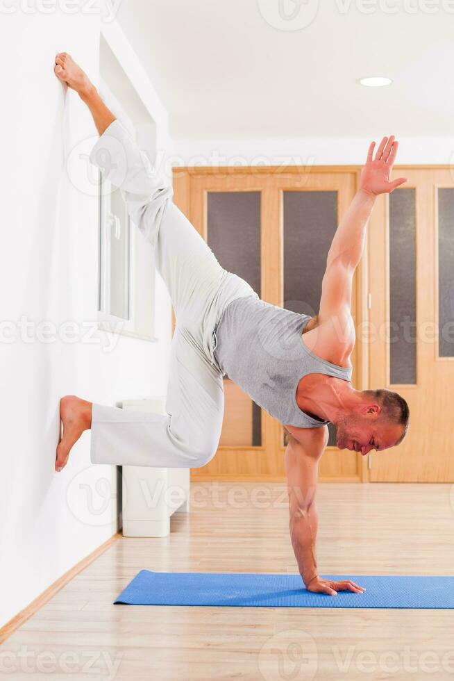 Man doing physical exercises photo