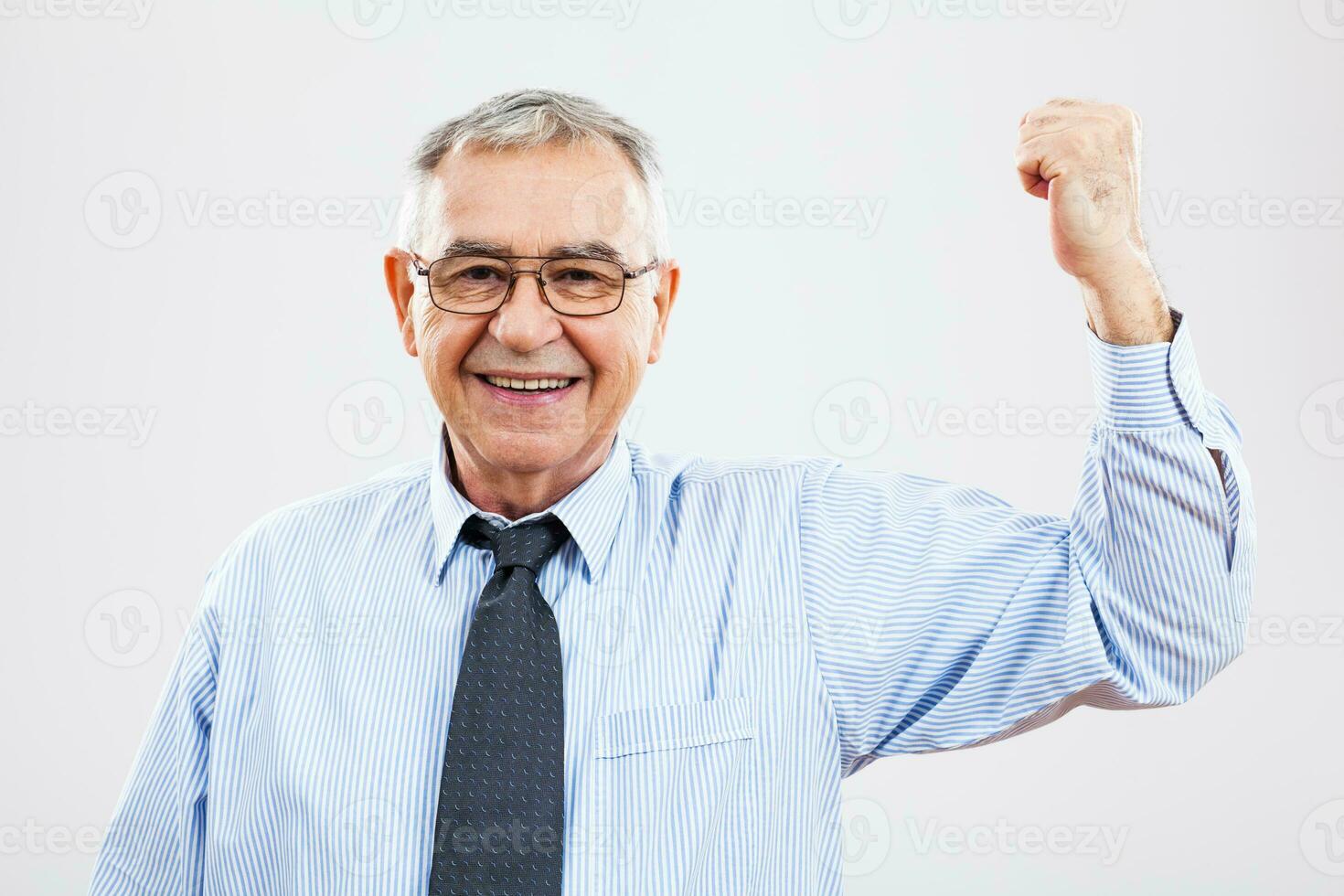 Portrait of a happy senior businessman photo