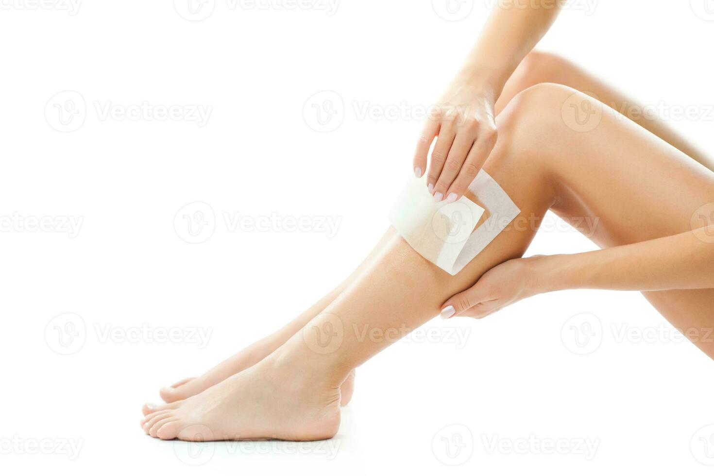 A woman taking care of her feet photo