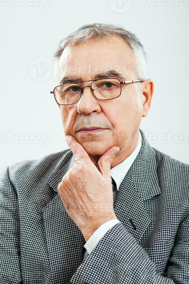 Portrait of a serious senior businessman photo
