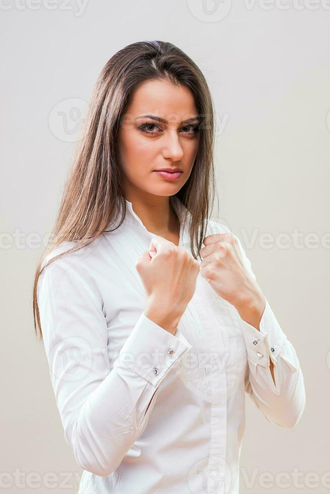 A strong woman in a white shirt photo