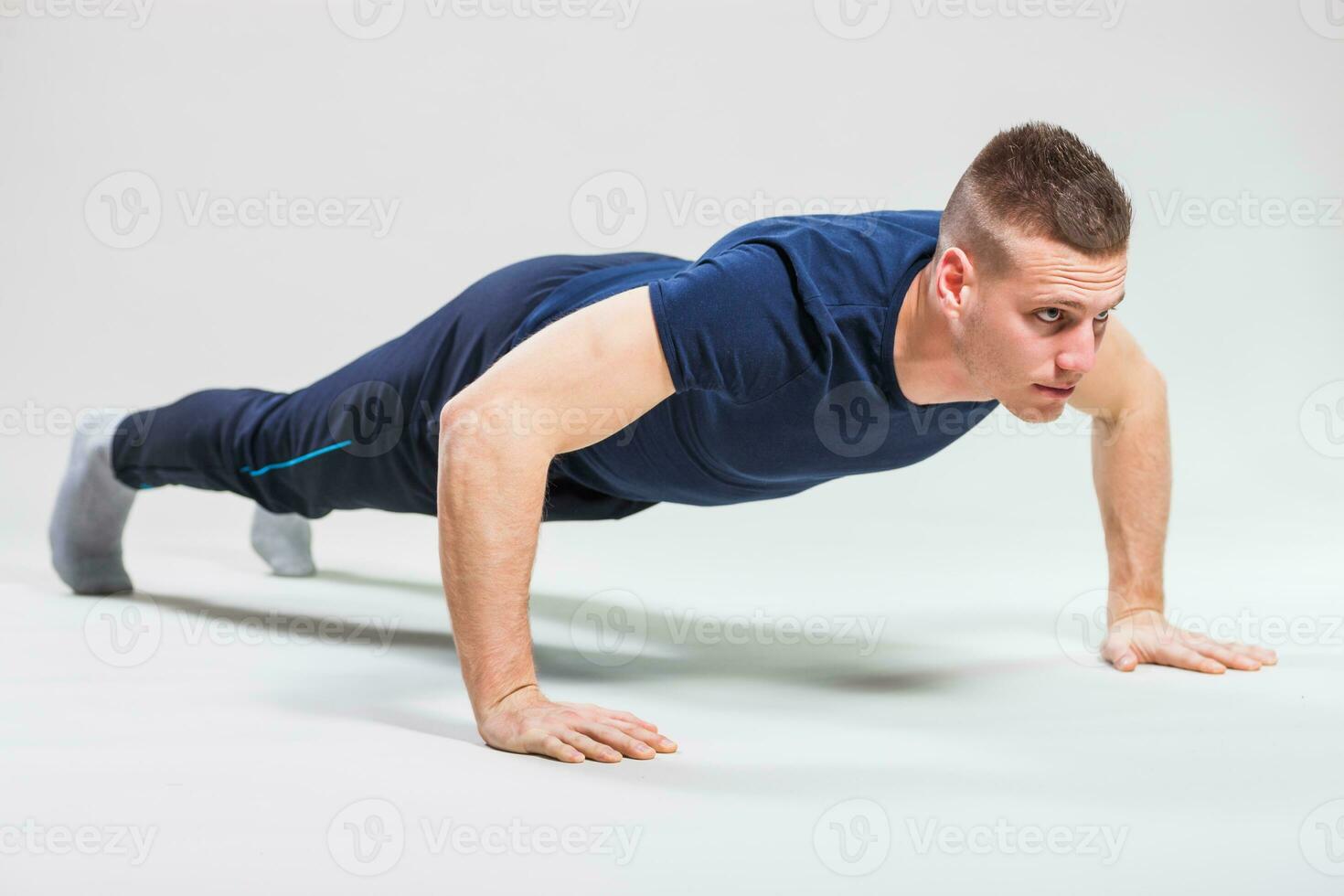 A man doing physical exercises photo