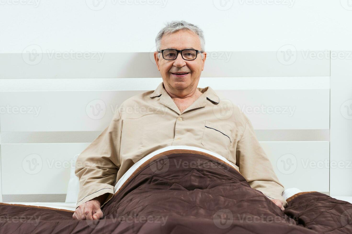 A senior man in his bedroom photo