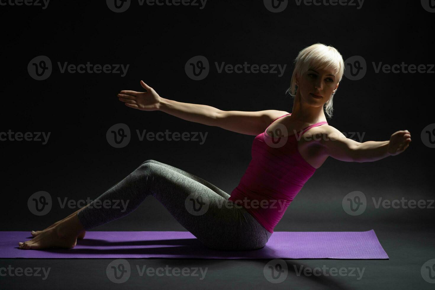 A woman doing physical exercises photo