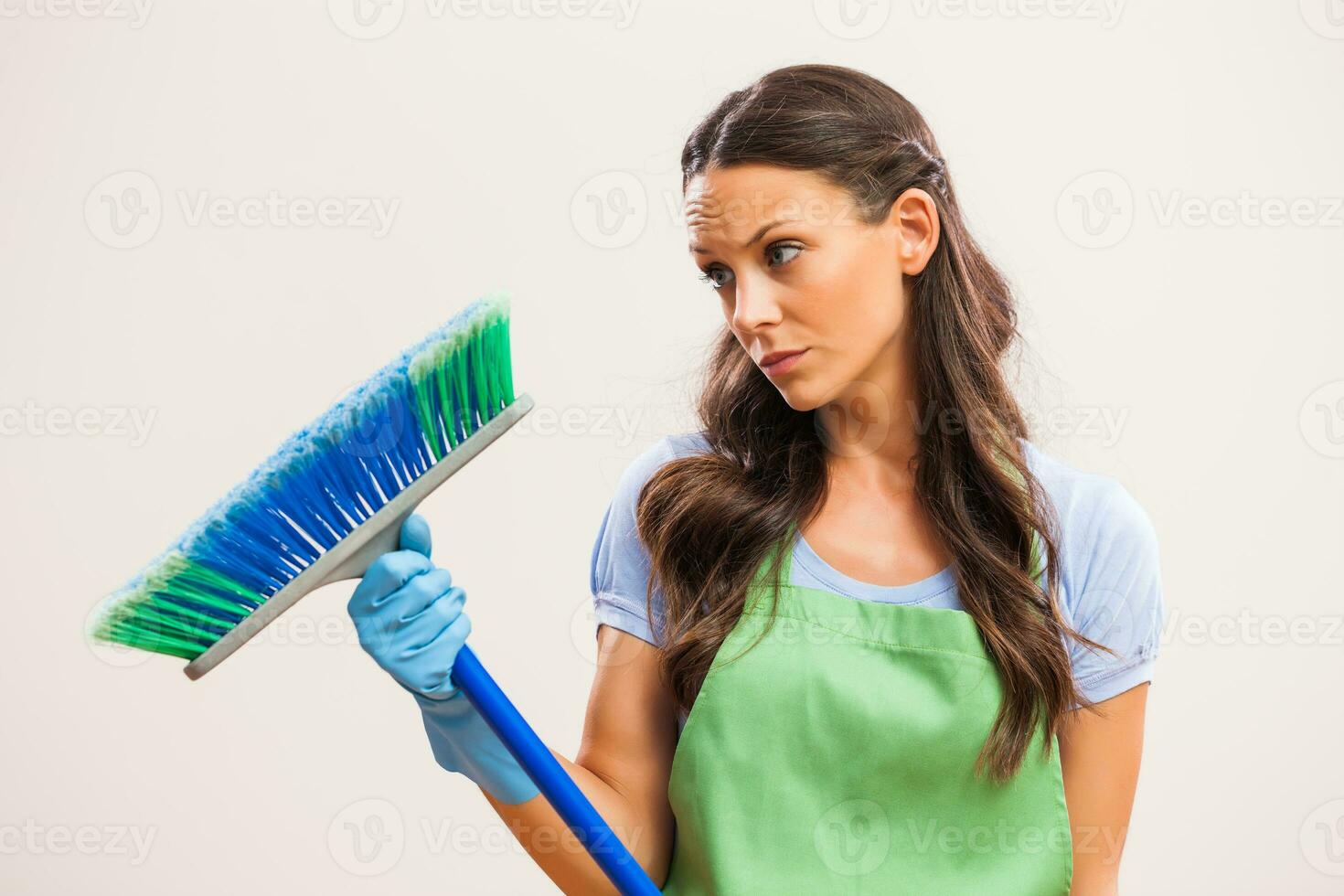 A woman who is going to clean the house photo