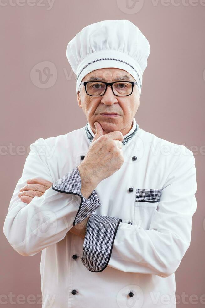 Portrait of a senior chef photo