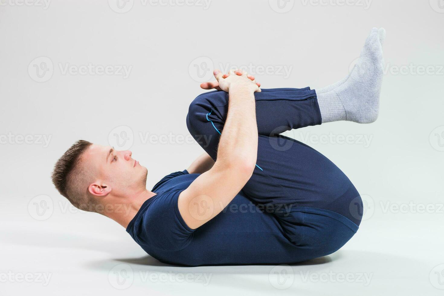 A man doing physical exercises photo