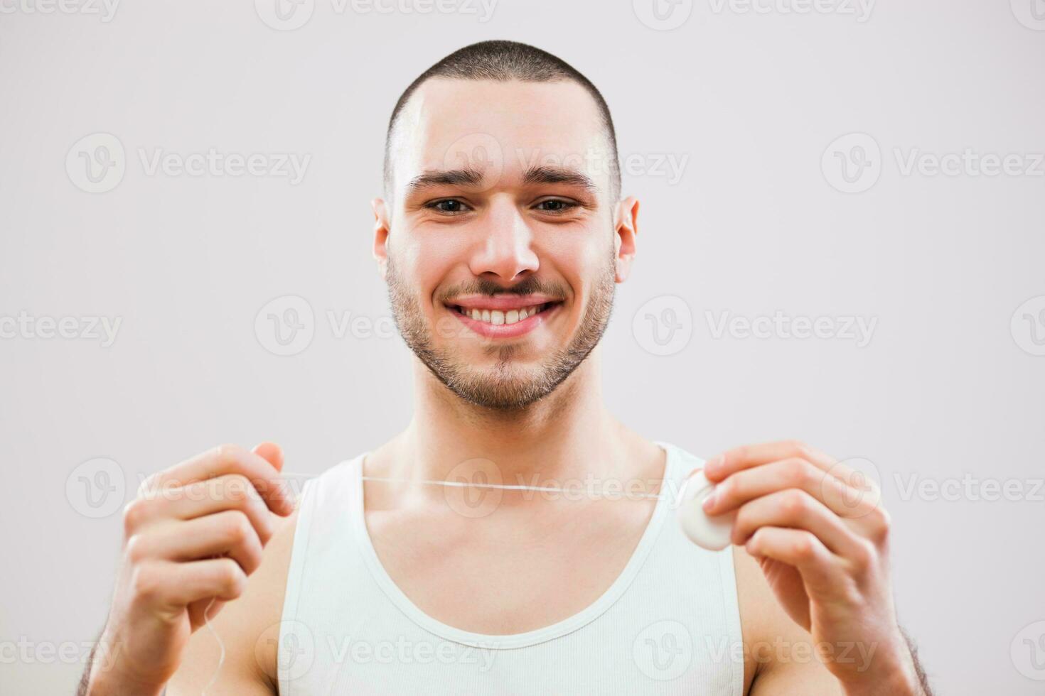 A man who takes care of his teeth photo