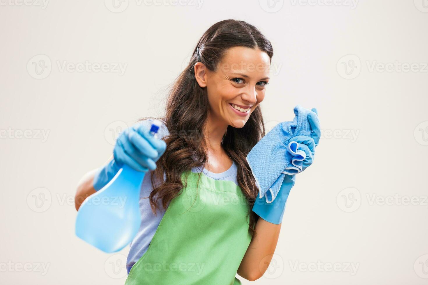 A woman who is going to clean the house photo