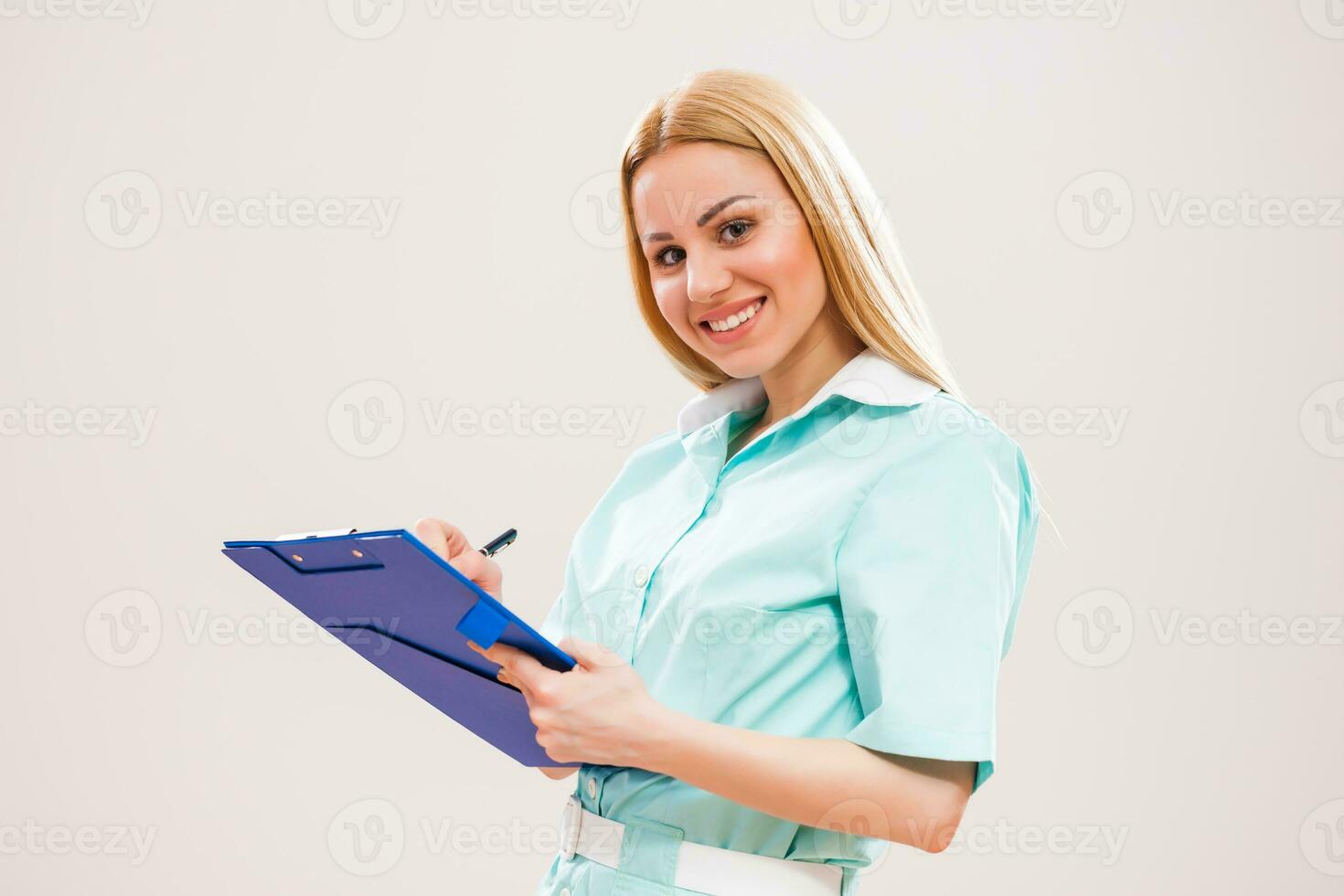 Portrait of a nurse with clipboard photo