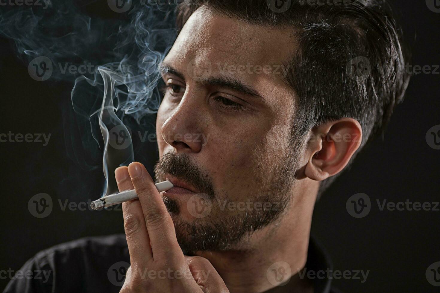 A man smoking photo