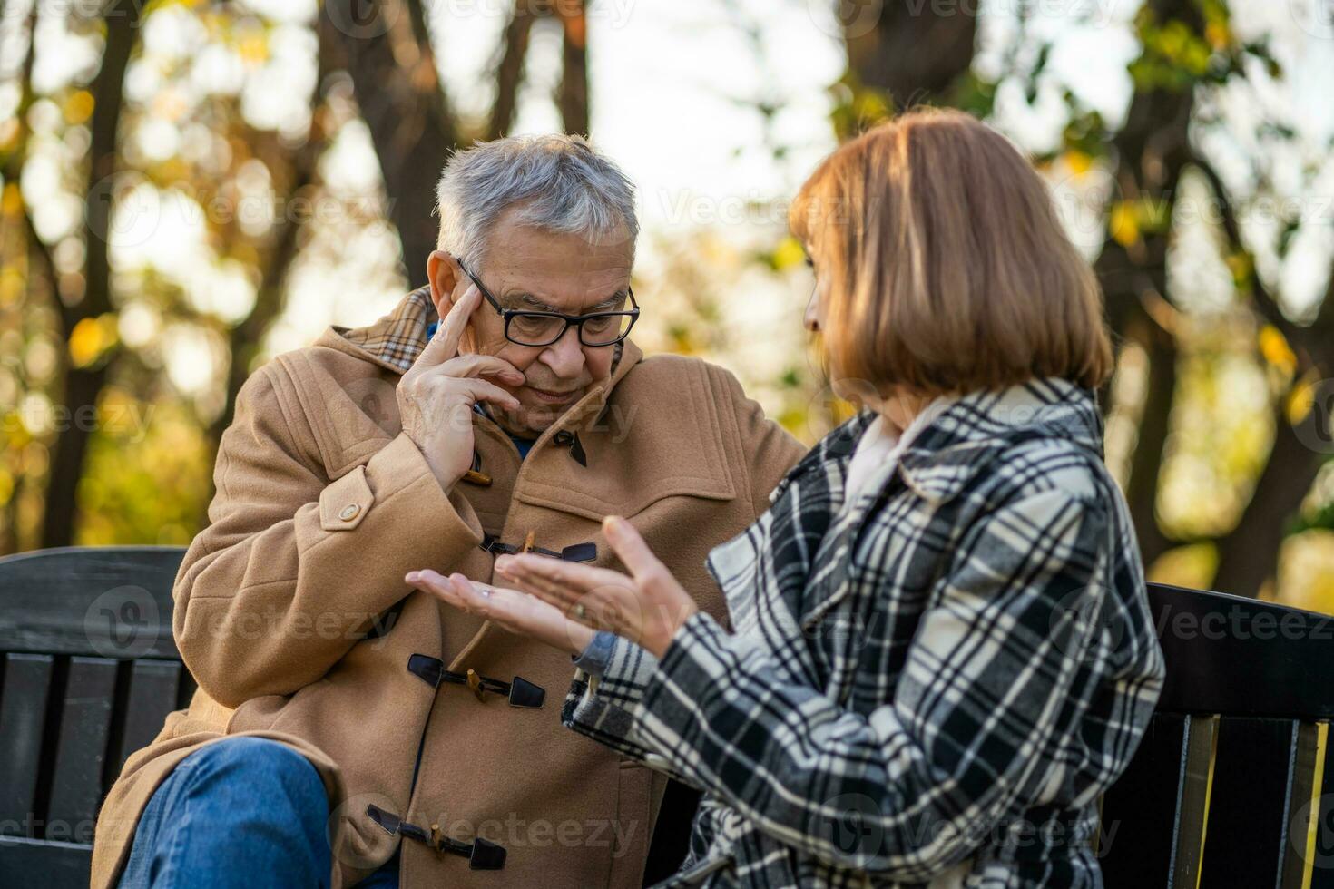 A senior couple spending time together in the park photo