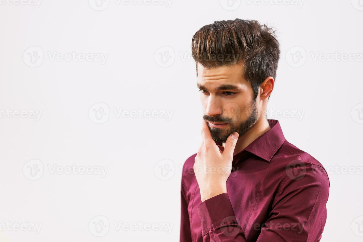 A man in a purple shirt photo