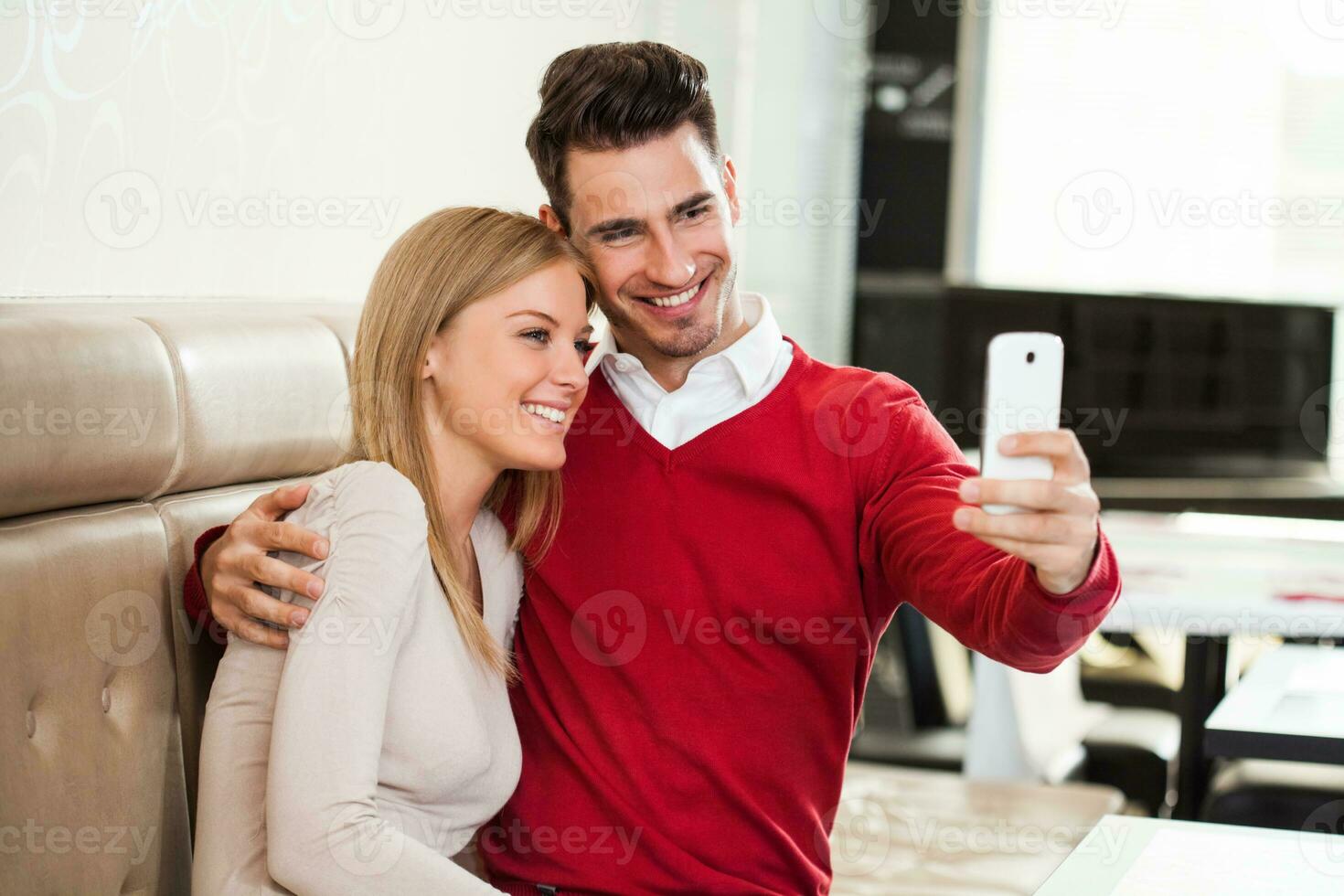 A couple in a coffee shop photo