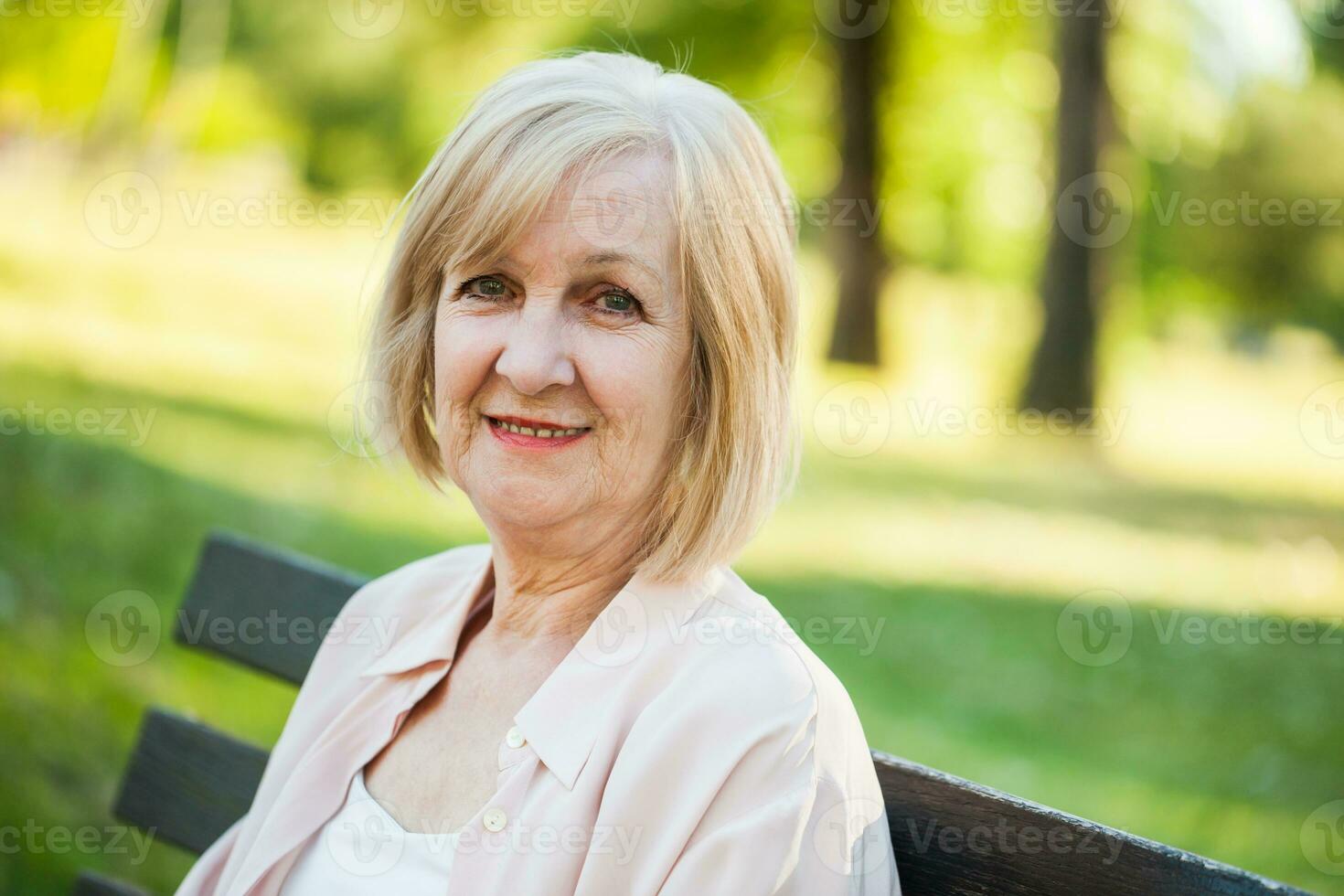 A senior woman in the park photo