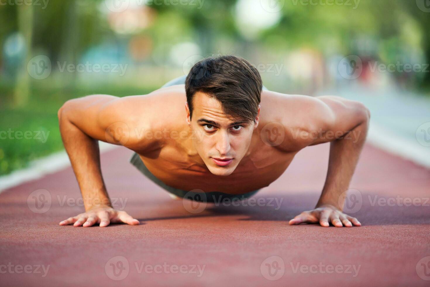 A man doing physical exercises photo