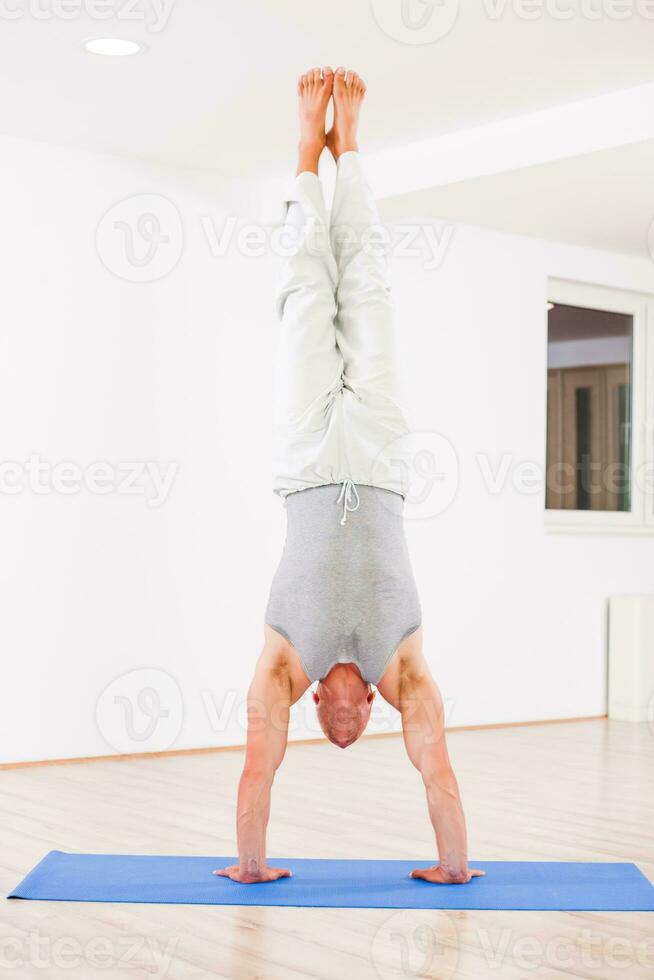 Man doing physical exercises photo