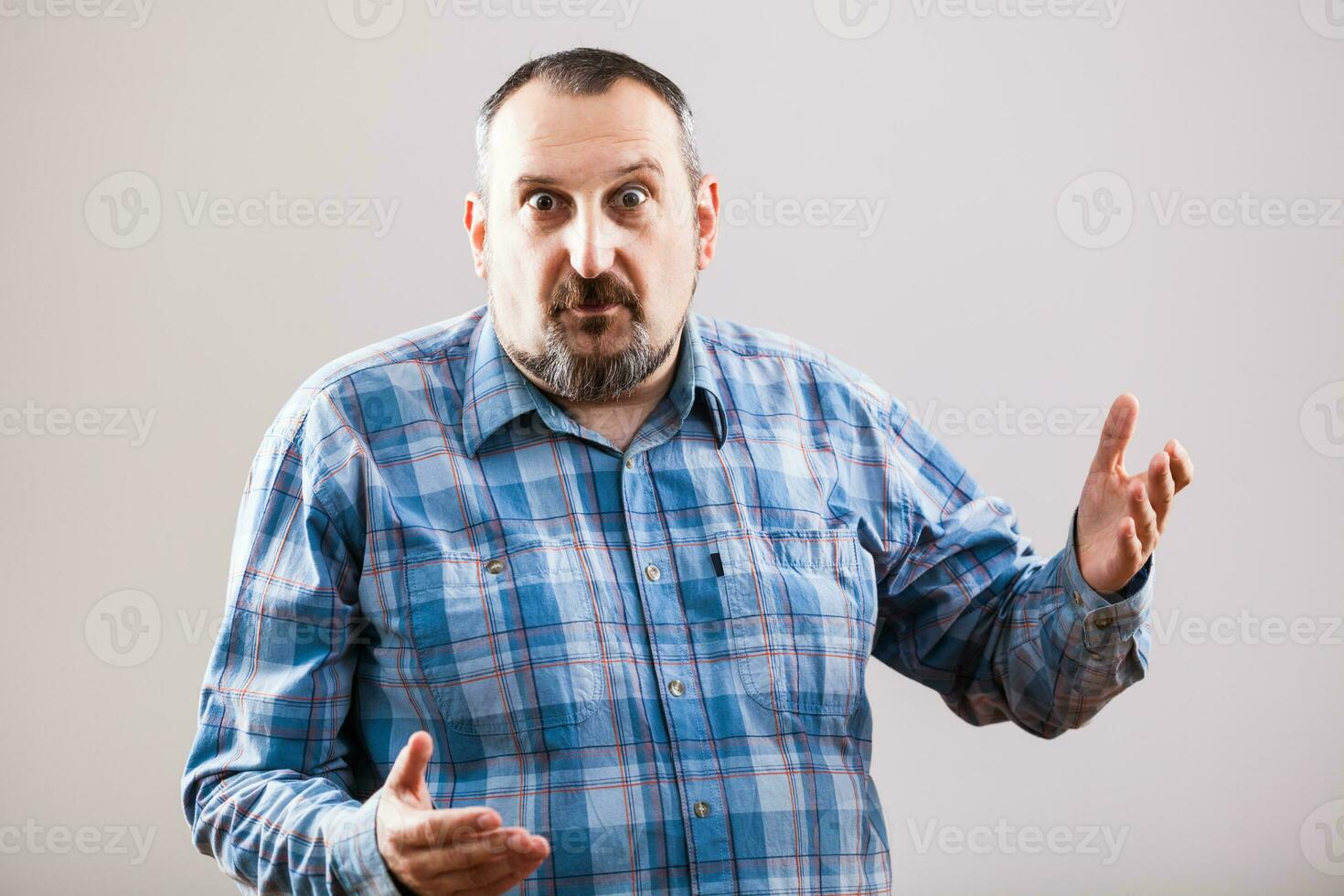 Portrait of a man with blue plaid shirt photo