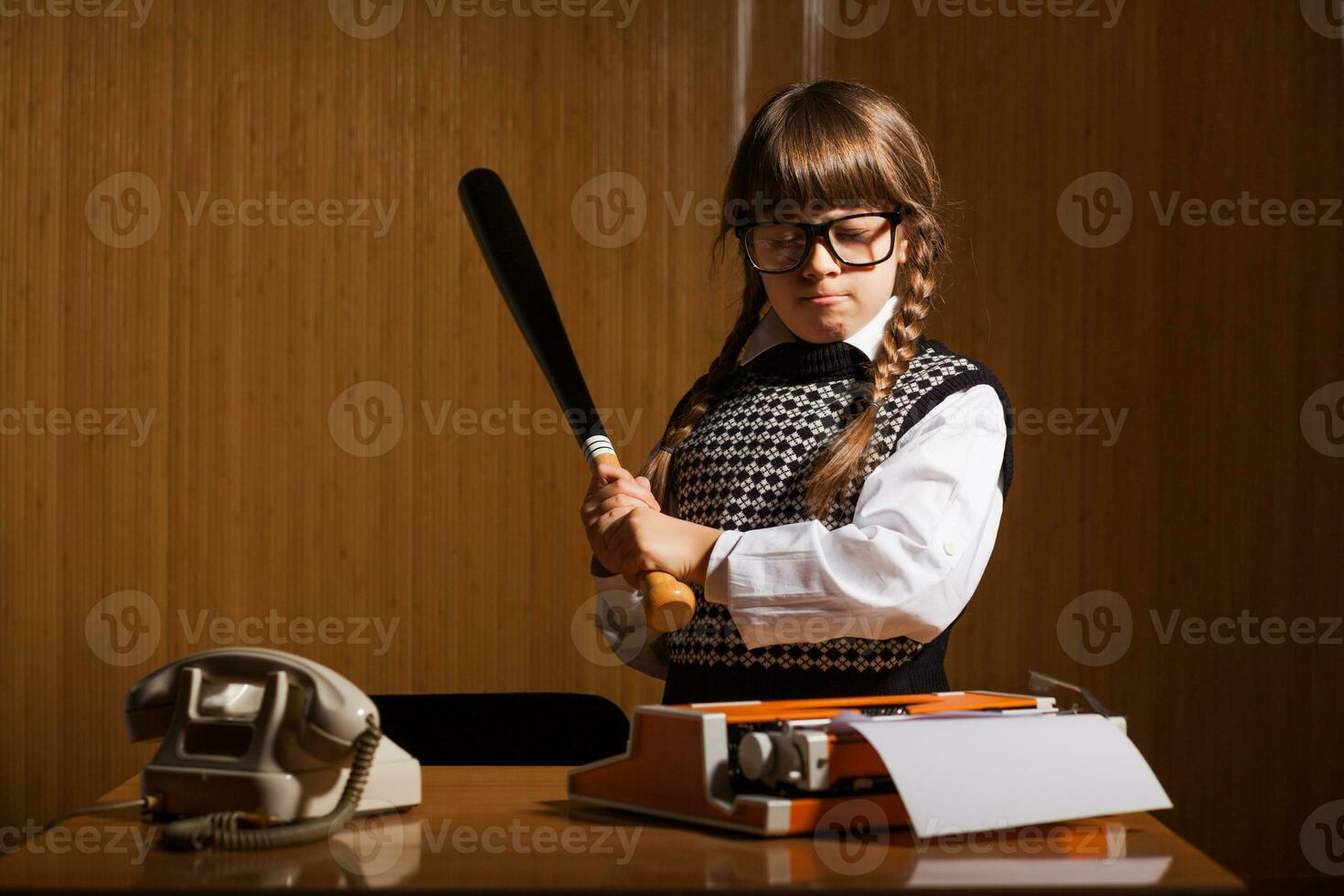 un niña quien obras de teatro el papel de un secretario foto