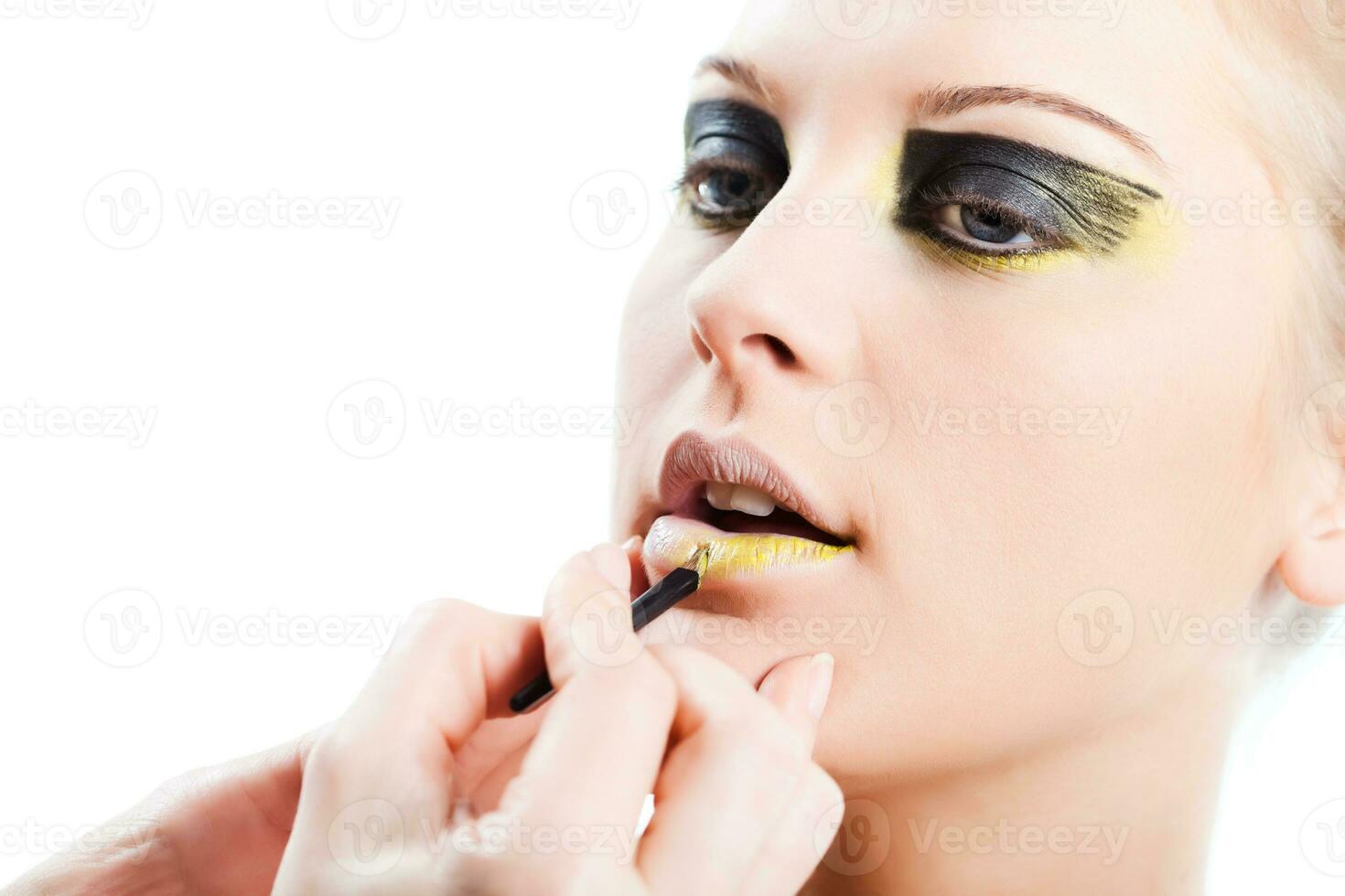 Portrait of young woman with fashion make-up photo