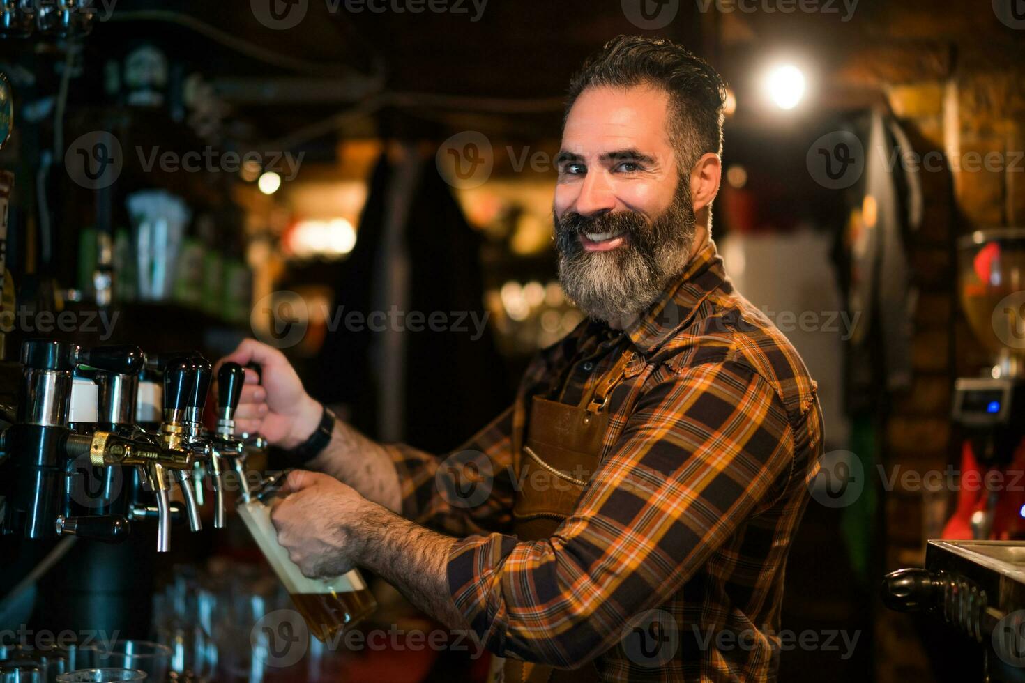 Portrait of a man who works as a bartender photo