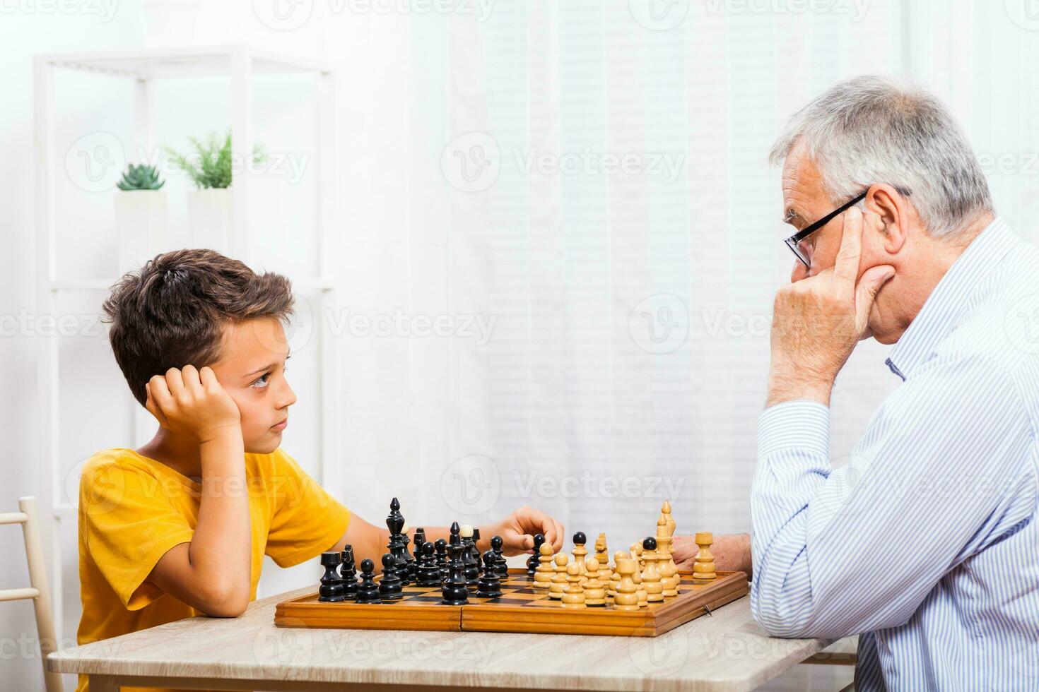 A grandfather spending time with his grandson photo