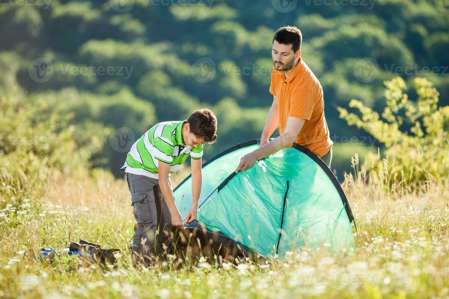 Father and son camping photo