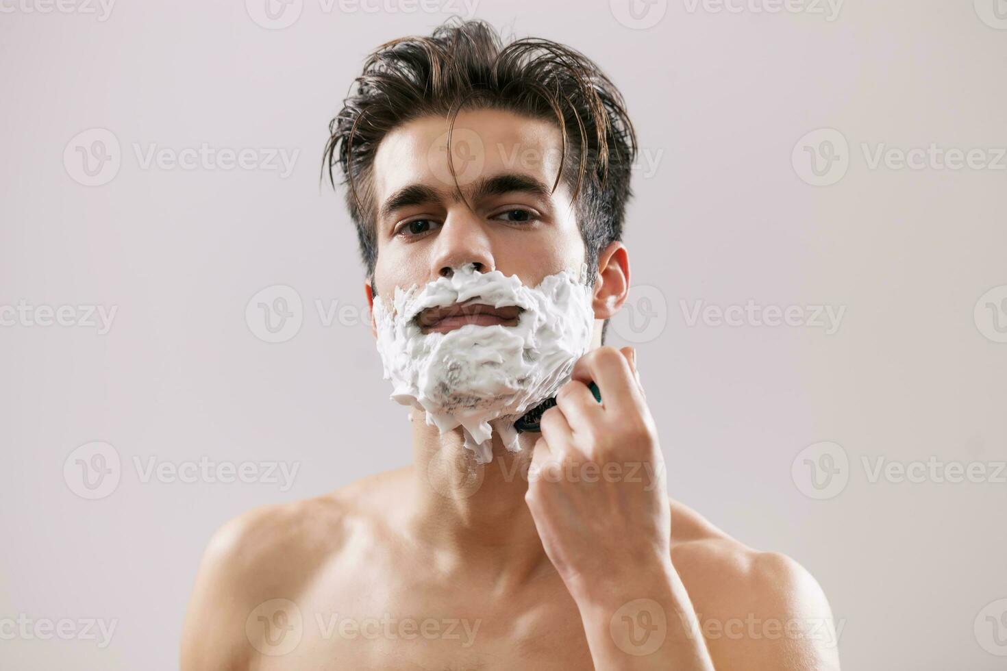 A man shaving photo