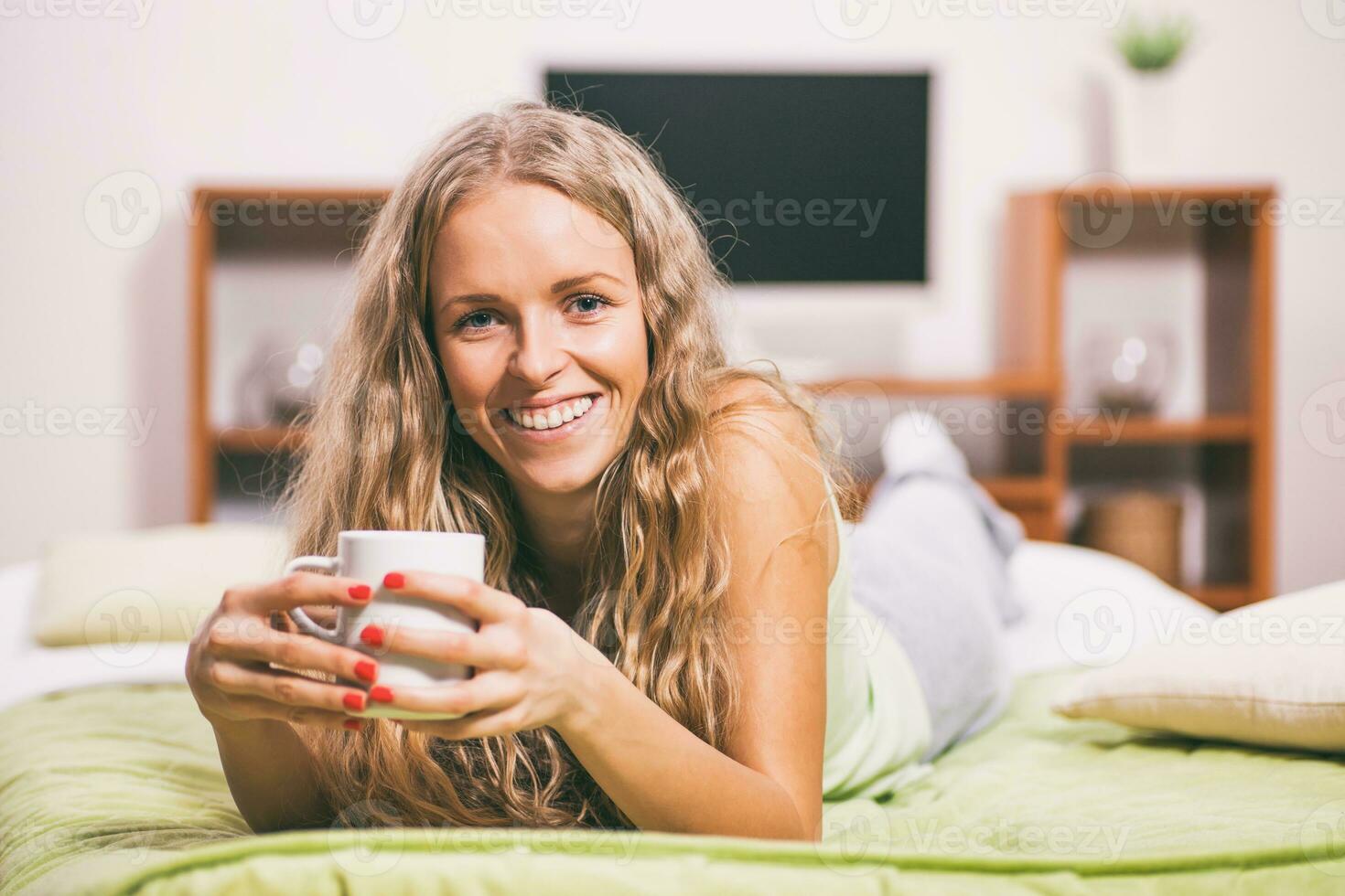 A woman in her bedroom photo