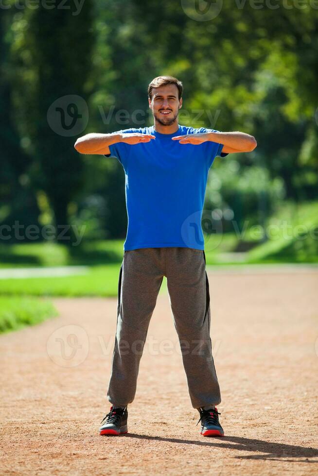 A man doing physical exercises photo